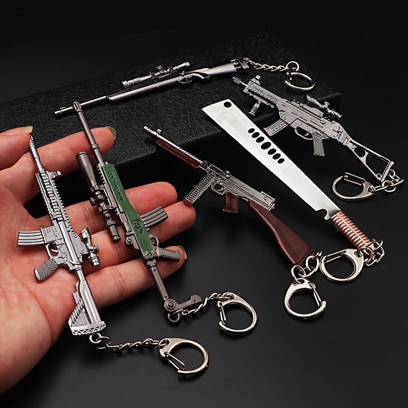 1 llavero de pistola de juguet - Heavy Equipment Key Ring reseña y precio