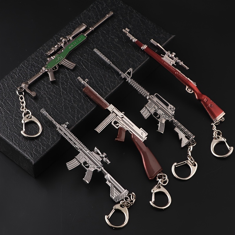 1 llavero de pistola de juguet - Heavy Equipment Key Ring reseña y precio