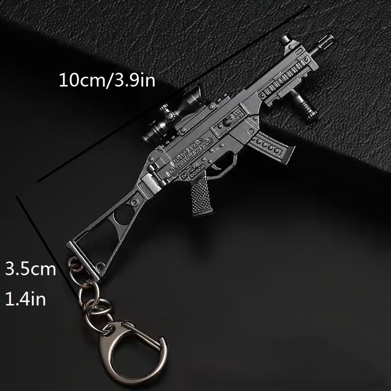 1 llavero de pistola de juguet - Heavy Equipment Key Ring reseña y precio